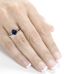 Antique Floral Eternity Band with 1 Carat Blue Sapphire and 0.4 Carat Total Diamond Weight in White Gold by Yaffie