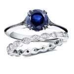 Antique Floral Eternity Band with 1 Carat Blue Sapphire and 0.4 Carat Total Diamond Weight in White Gold by Yaffie