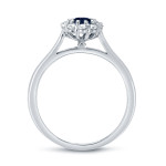 Blue Sapphire and Diamond Halo Engagement Ring