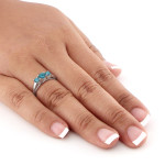 Gold Yaffie Ring featuring 2ct of Brilliant Blue Round Diamonds in a Three-stone setting