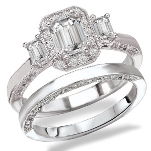 Bridal Set with Sparkling Cubic Zirconia Emerald Cut Center and Rhodium Plated Sterling Silver Three Stone Look by Yaffie