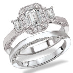 Rhodium-Plated Sterling Silver Bridal Set with Cubic Zirconia Emerald Cut Center & Three Stone Design by Yaffie