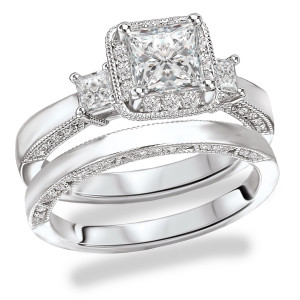 Sparkling Rhodium Plated Sterling Silver Bridal Set with Princess Cut Centerpiece and Halo Design Cubic Zirconia Stones by Yaffie