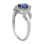 Dazzling Blue Sapphire Oval Ring with White Gold and Diamond Accents - Perfect for Engagements!