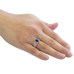 Gorgeous Vivid Blue Oval Sapphire and Diamond Halo Engagement Ring in White Gold by Yaffie