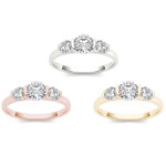 Sparkling Yaffie gold anniversary ring with 1.25 carat TDW diamonds and three striking stones.