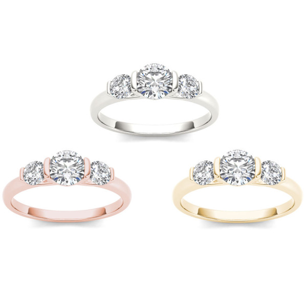 Sparkling Yaffie gold anniversary ring with 1.25 carat TDW diamonds and three striking stones.