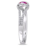 Engage in Elegance with Yaffie Ruby & Diamond Halo Ring from the Signature Collection in White Gold!