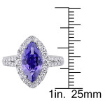 Yaffie Marquise Tanzanite & Diamond Halo Ring from the Signature Collection in White Gold.