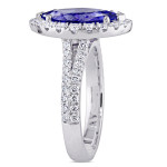 Yaffie Marquise Tanzanite & Diamond Halo Ring from the Signature Collection in White Gold.
