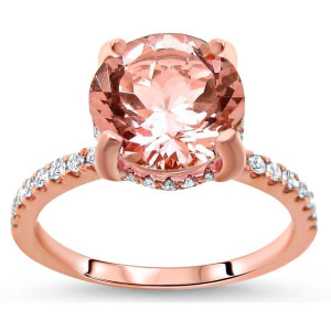 The stunning Yaffie Morganite and Diamond Engagement Ring dazzles in Rose Gold with 1 9/10ct of round-cut brilliance.